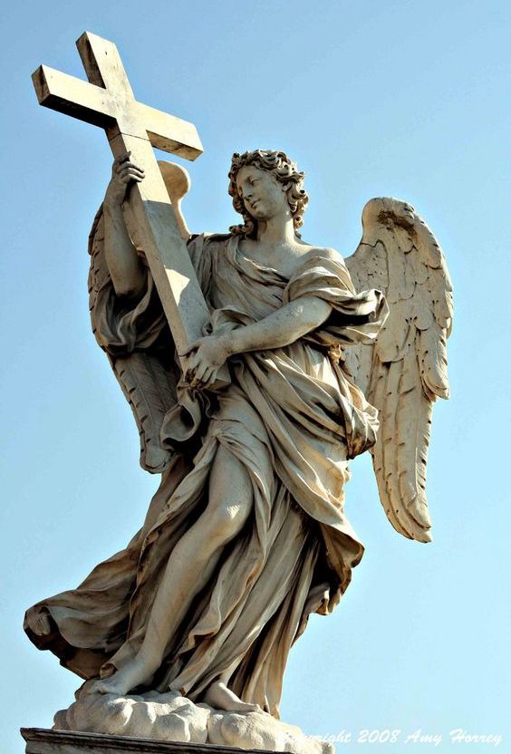 The Famous Marble Angel Statue with the Cross