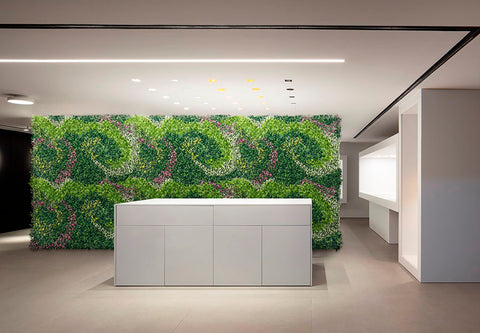 artificial green wall in office lobby