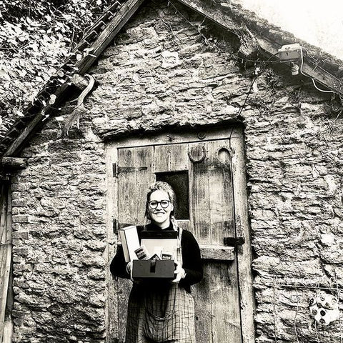 Me outside the wash house, work shop.