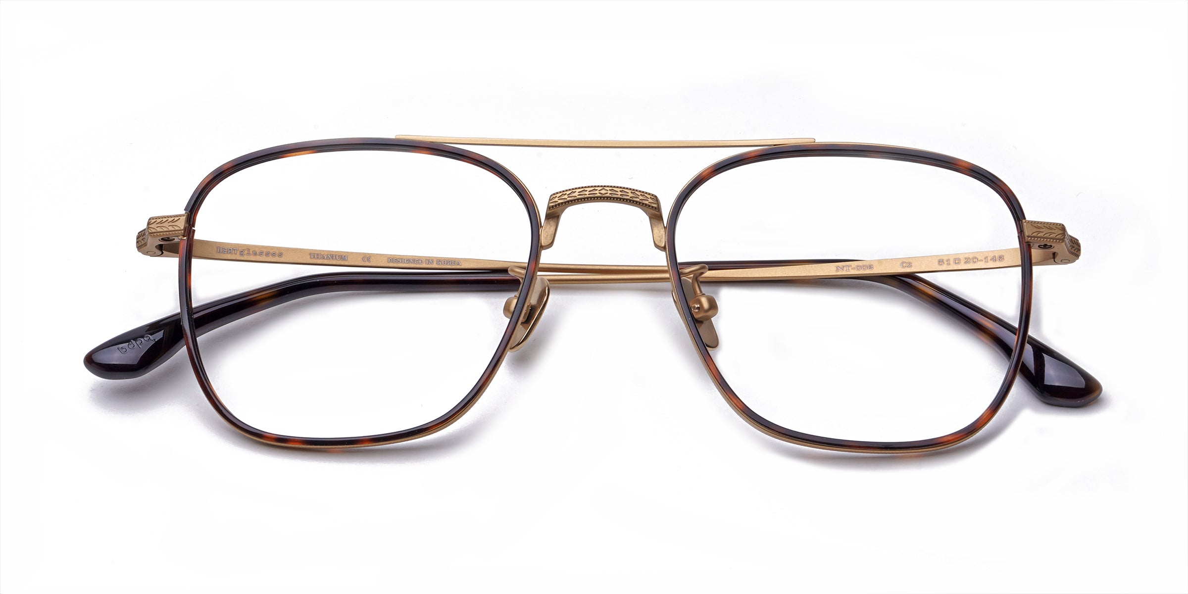 neat glossy tortoiseshell eyeglasses frames top view