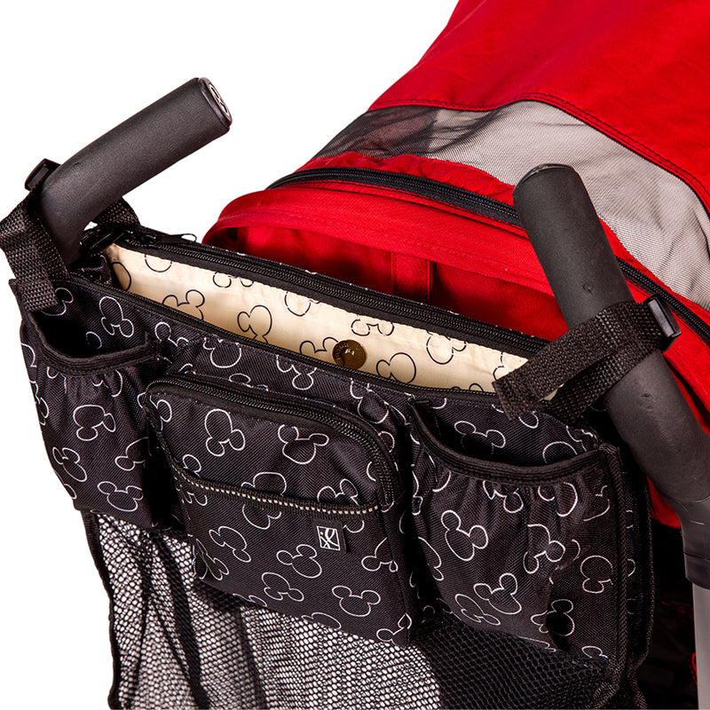 Close up picture of pockets on the Disney Baby Cups ‘N Cargo Stroller Organizer