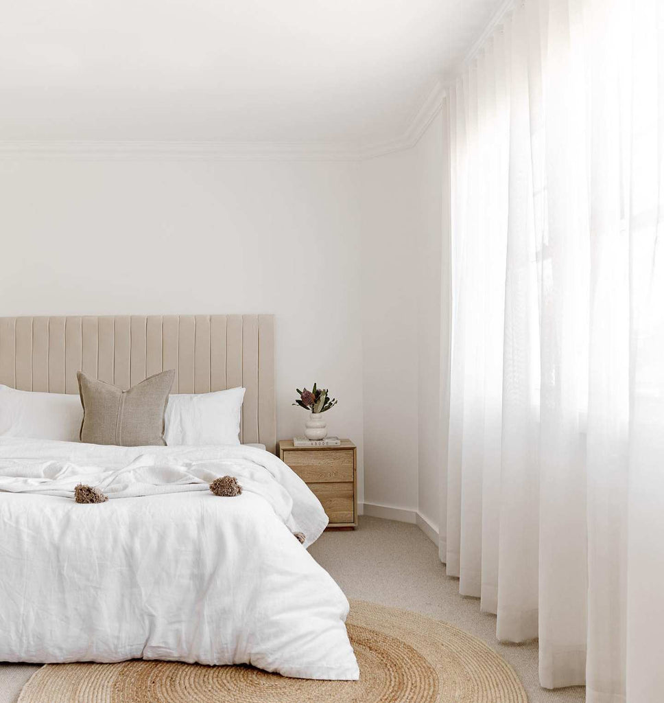 light and airy bedroom with white walls
