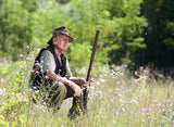 Elder Hunter in Nature: Contemplating the Hunt, Shotgun at Rest