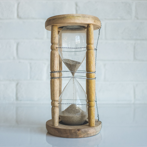 An hour glass sand timer