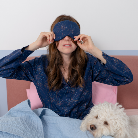 taking a nap in bright spark pyjamas with matching eye mask