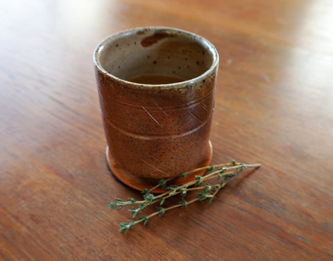 Spiced & Sparkling Mocktail in a ceramic cup