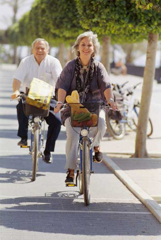 Elder Couple Riding Electric Bike