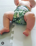 Baby Laying in Botanical Cloth Nappy
