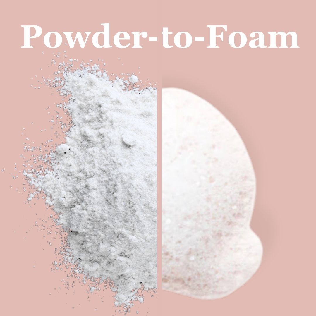 Powder transforming into foam on a pink background with the text 'Powder-to-Foam.'