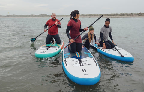 group paddleboarding on inflatable-SUP