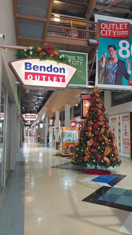 Decorated Christmas tree at Outlet City by Christmas Creatives