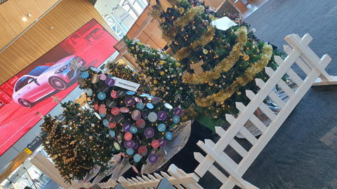 Some of the decorated Christmas trees by Christmas Creatives at Wellington Airport