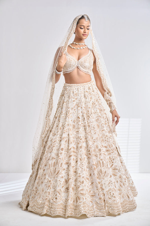 Ivory Gota Patti Embroidered Lehenga Set Design by Seema Gujral at Pernia's  Pop Up Shop 2024