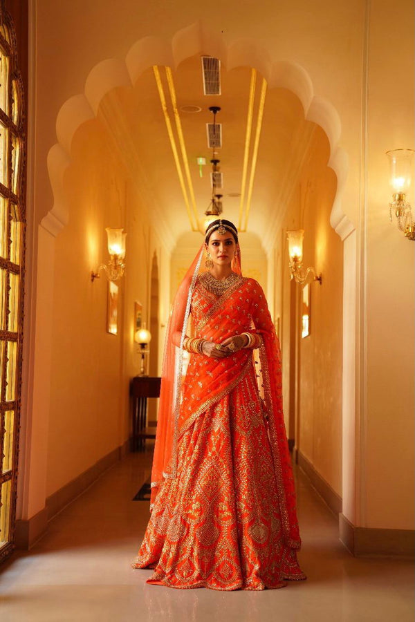 Burnt Orange(orange) Jacquard Graceful Burnt Orange Orange colored lehenga  at Rs 4599 in Bengaluru