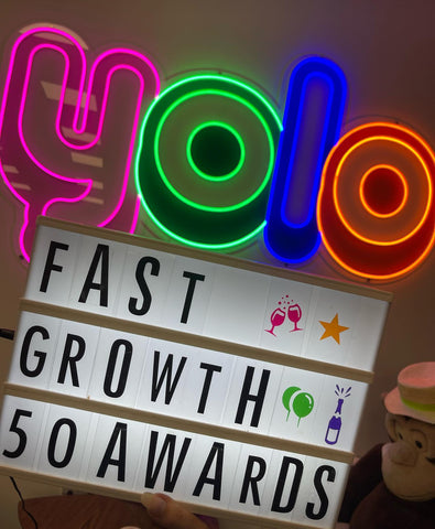 YOLO Fast 50 Growth Awards on NEON sign in Office in Richmond UK