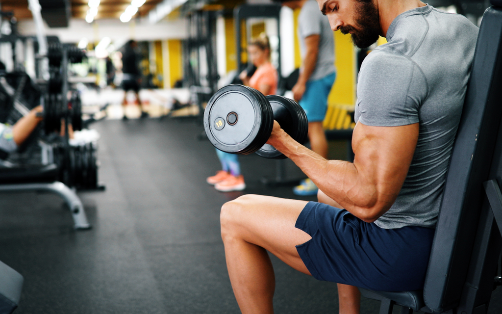 Man doing dumbbell curls