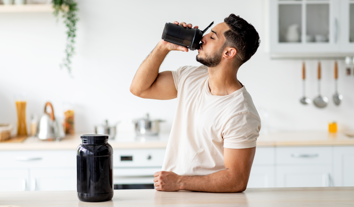 man drinking protein shake