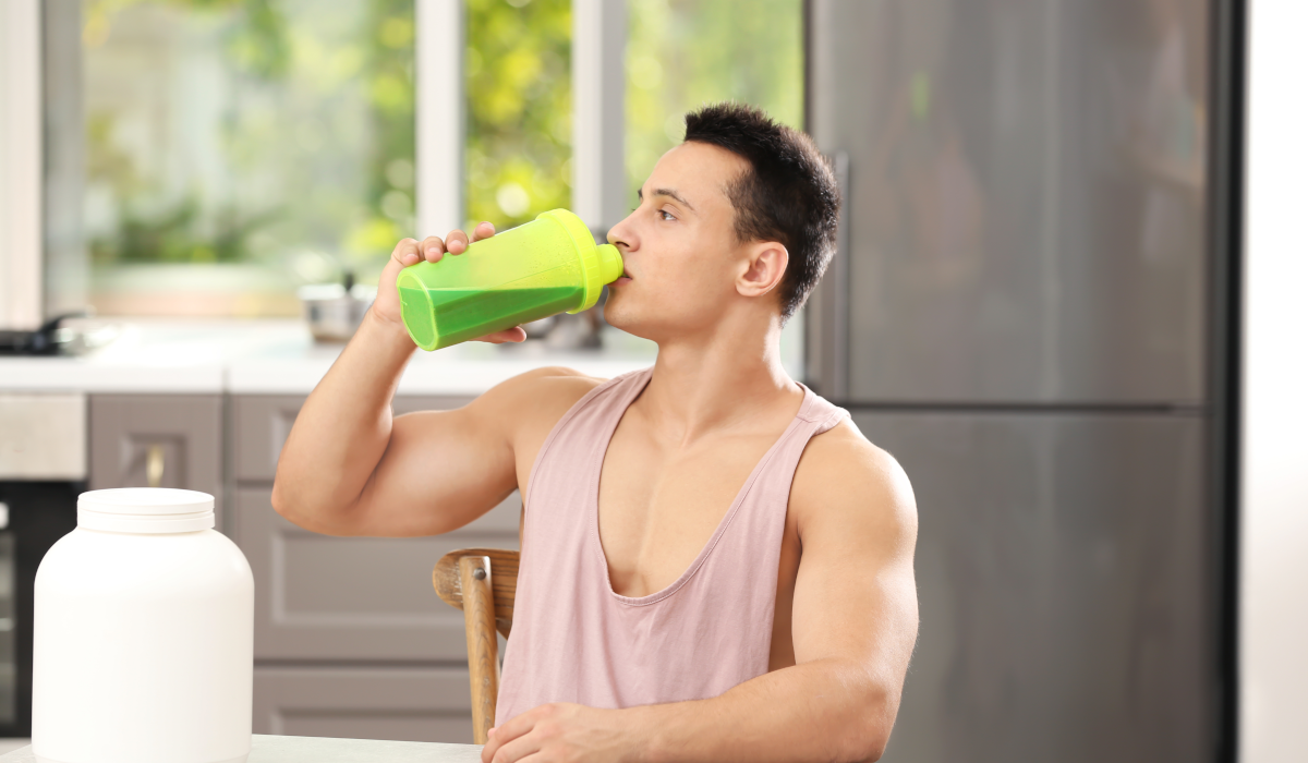 man drinking protein shake