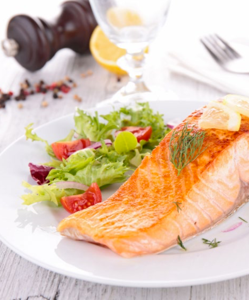 SALMON WITH GARLIC BUTTER HASSELBACK POTATOES