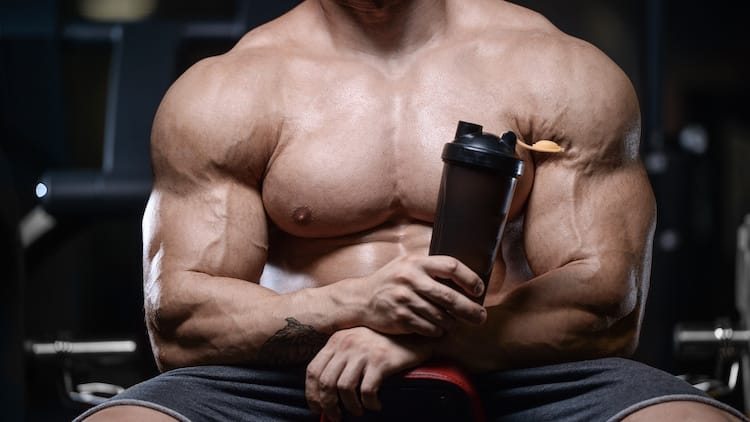 man drinks bodybuilding supplement