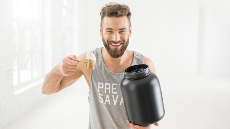 man with protein powder