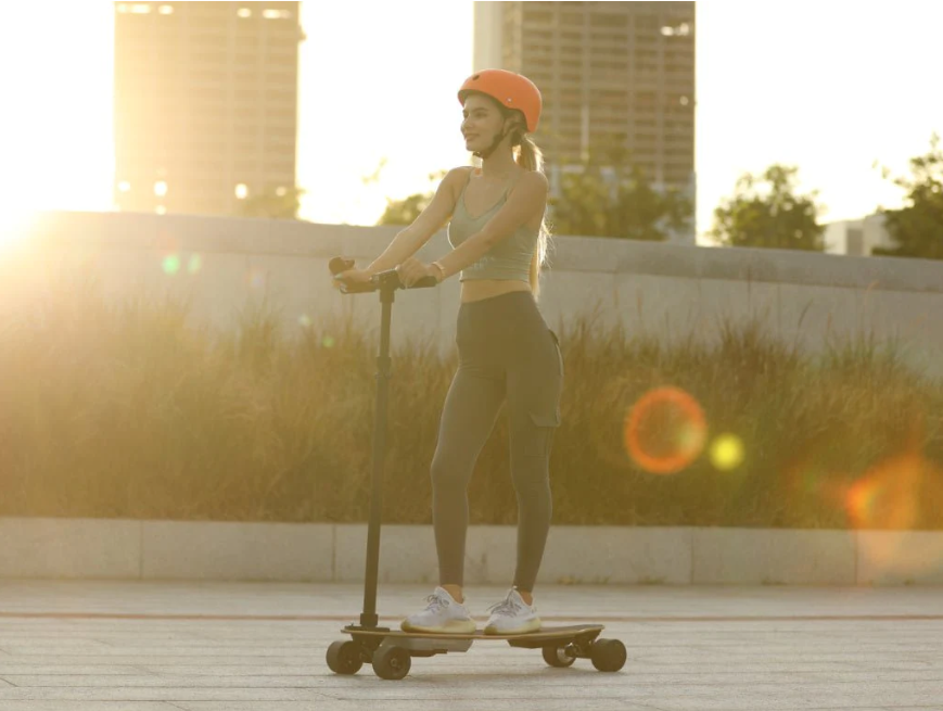 A Girl riding on UDITER electric skateboard