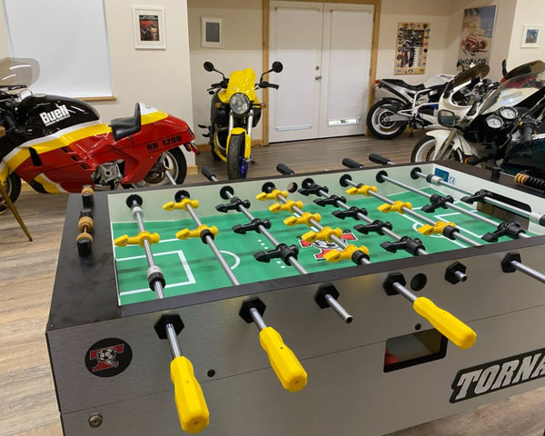 Tornado Tournament T-3000 Competition Foosball Table in Silver with Bikes in the Back