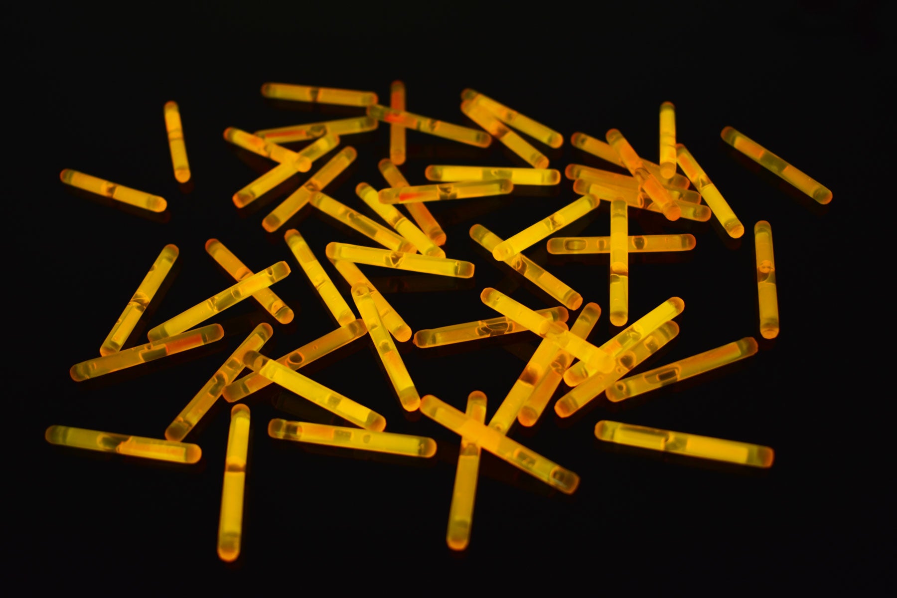 6 Inch Slim Orange Glow Sticks With Lanyards - Pack of 12