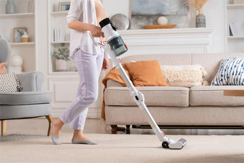 vacuuming the floor
