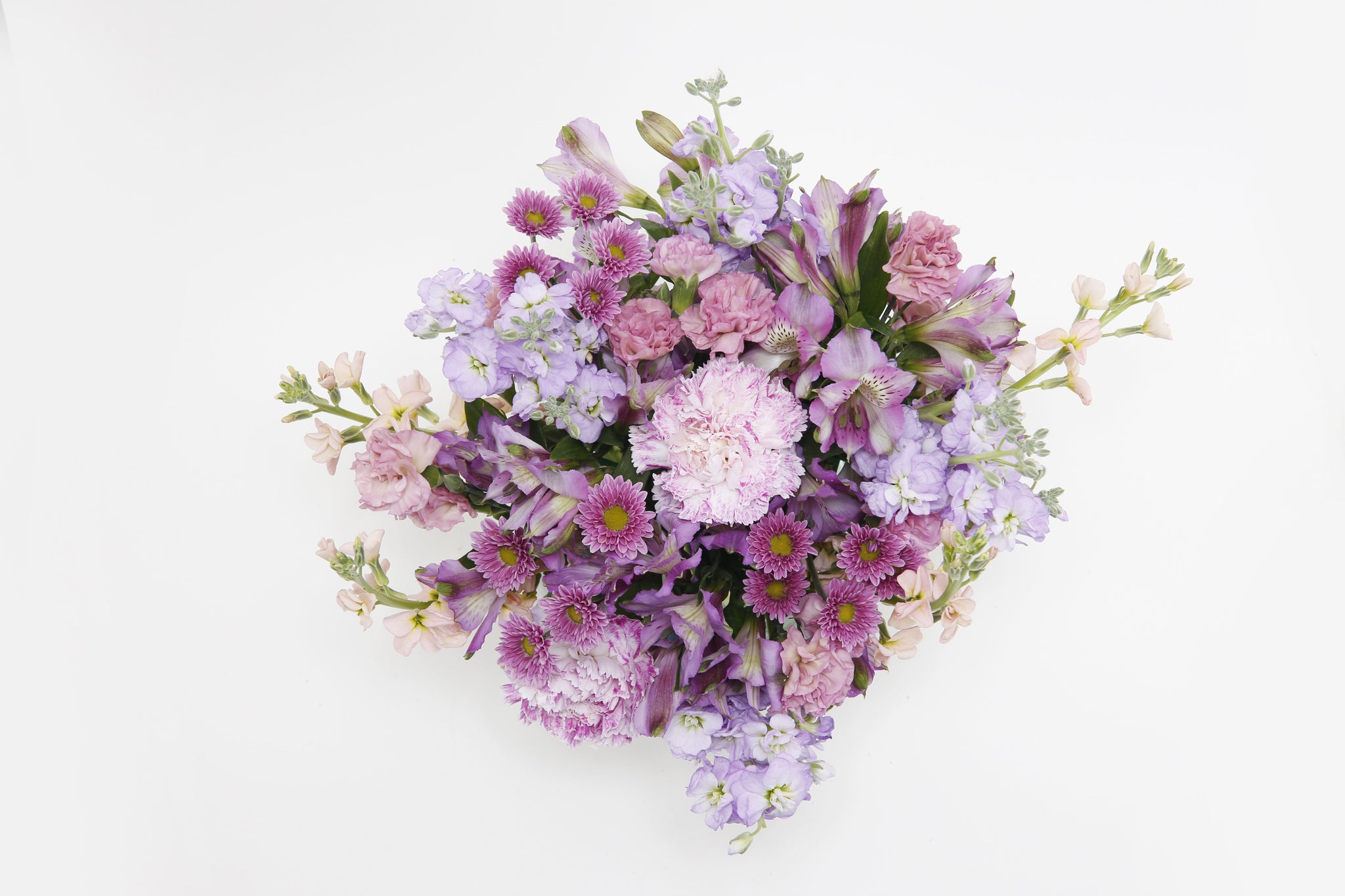 Delightful Discoveries Bouquet Top - lavender stock flowers, cream stock flowers, pink novelty carnations, purple alstroemeria flowers, purple button mums