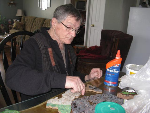 Romeo making his Sea Glass Prince Edward Island Maps