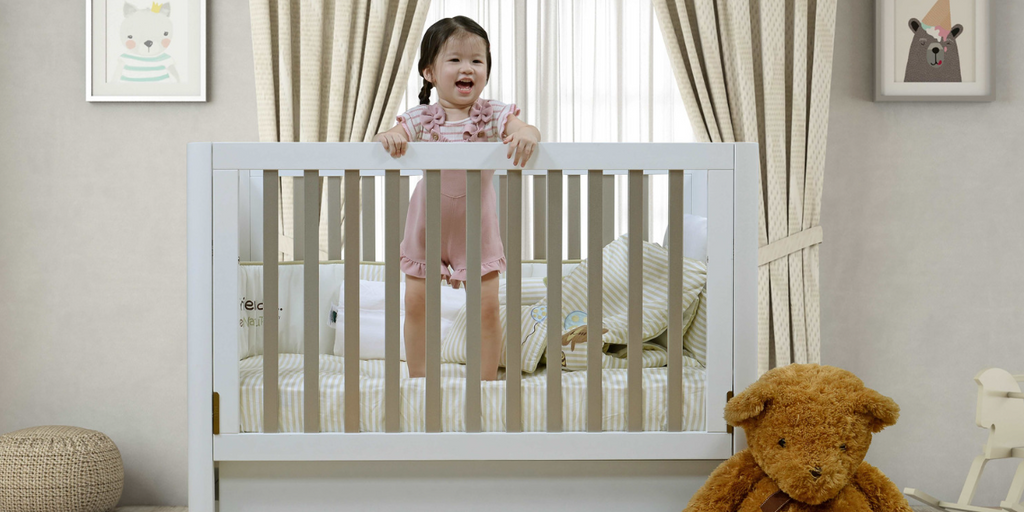 clean baby cot mattress makes a happy child