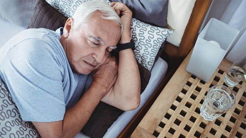 senior sleep on electric adjustable bed