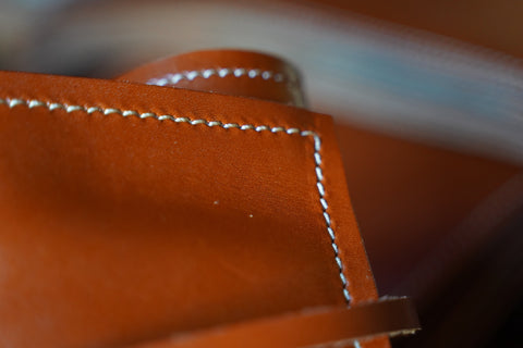 stitching on a leather folio