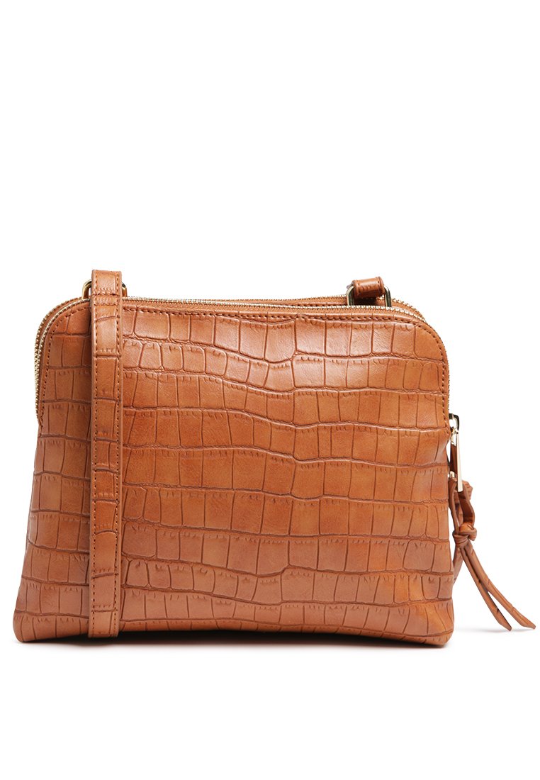 TAN CROC-TEXTURED SLING BAG