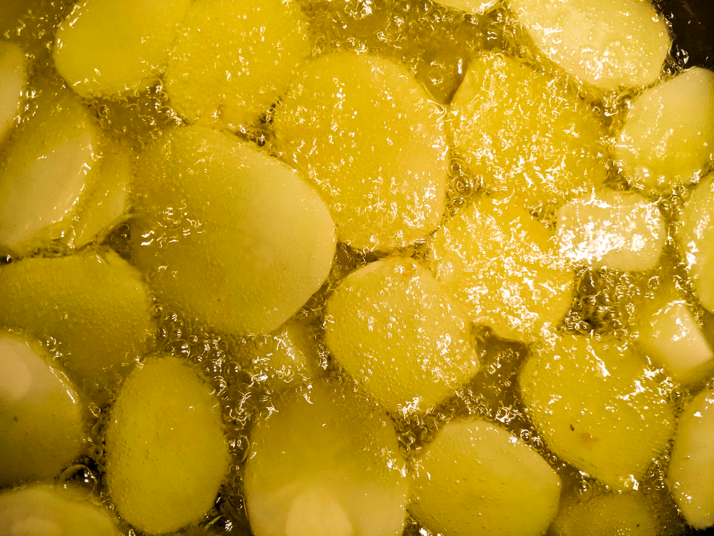 Frying in extra virgin olive oil.