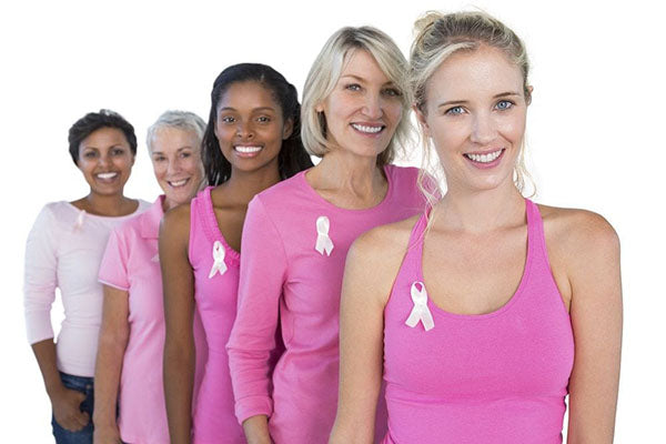 Image of 5 ladies dressed in pink with breast cancer ribbons