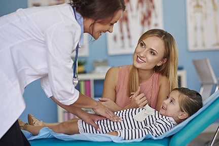 Image of doctor, parent and small child