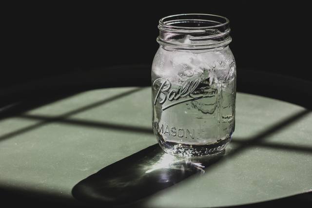 image of mason jar full of water