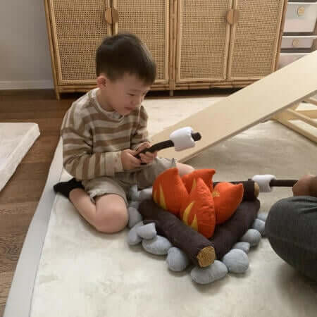 When building a cubby from a Funsquare kids play couch, add a campfire set for that "great outdoors" play.