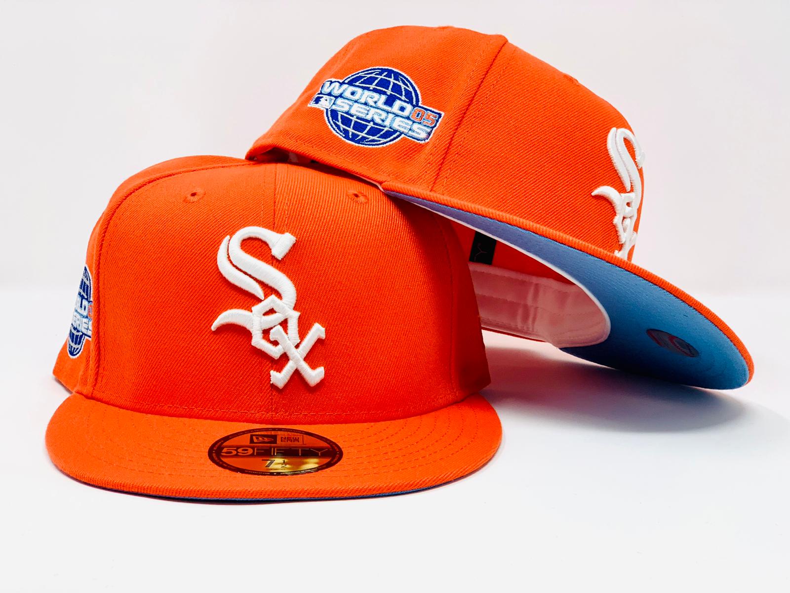 orange and white new era hat