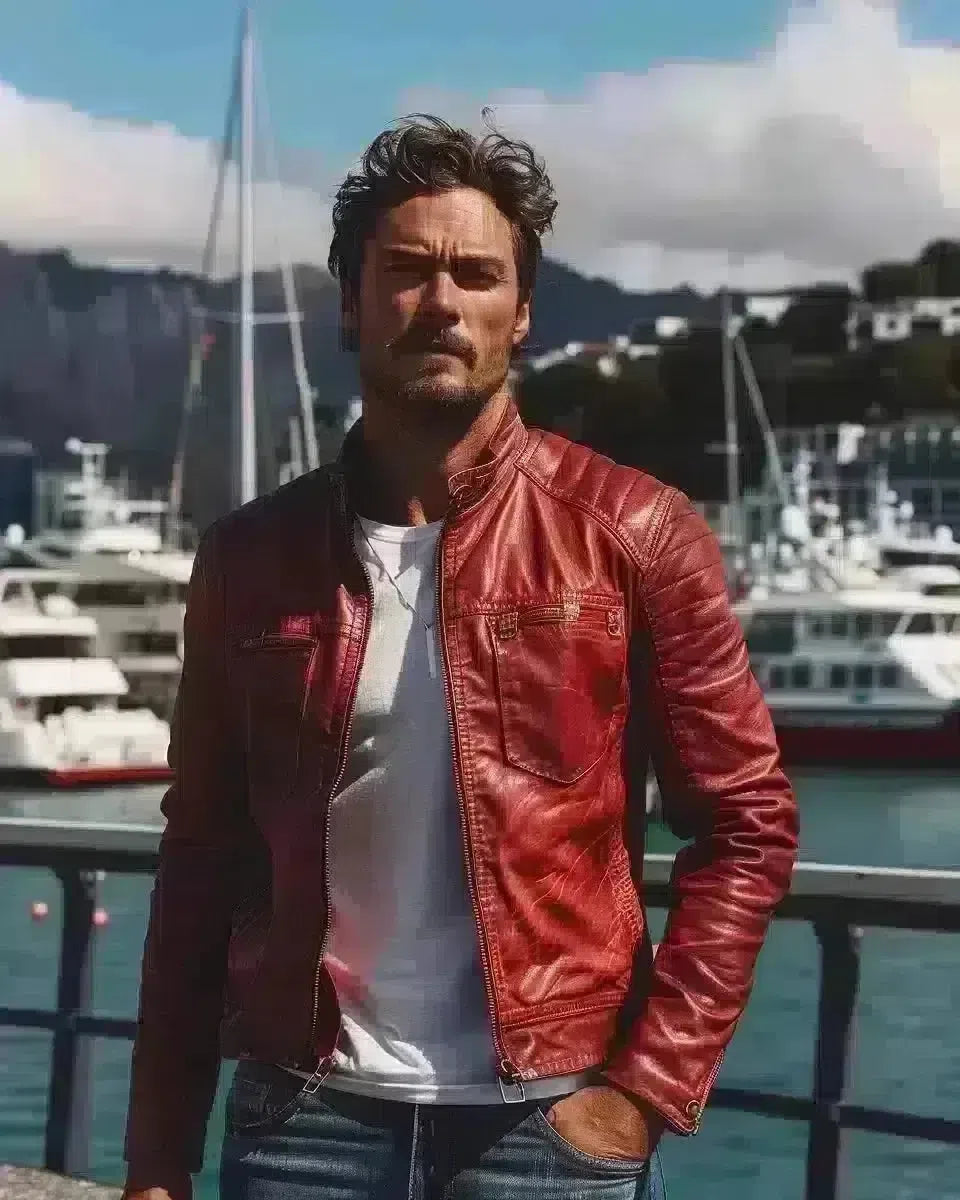 Wellington harbor male in raw denim jeans, white tee, red leather jacket. Spring season.