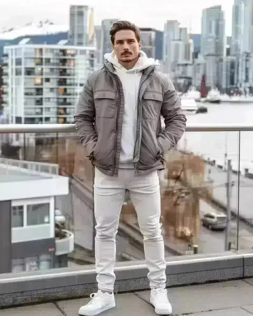 Man in slim white jeans, urban British Columbia background. Spring season.