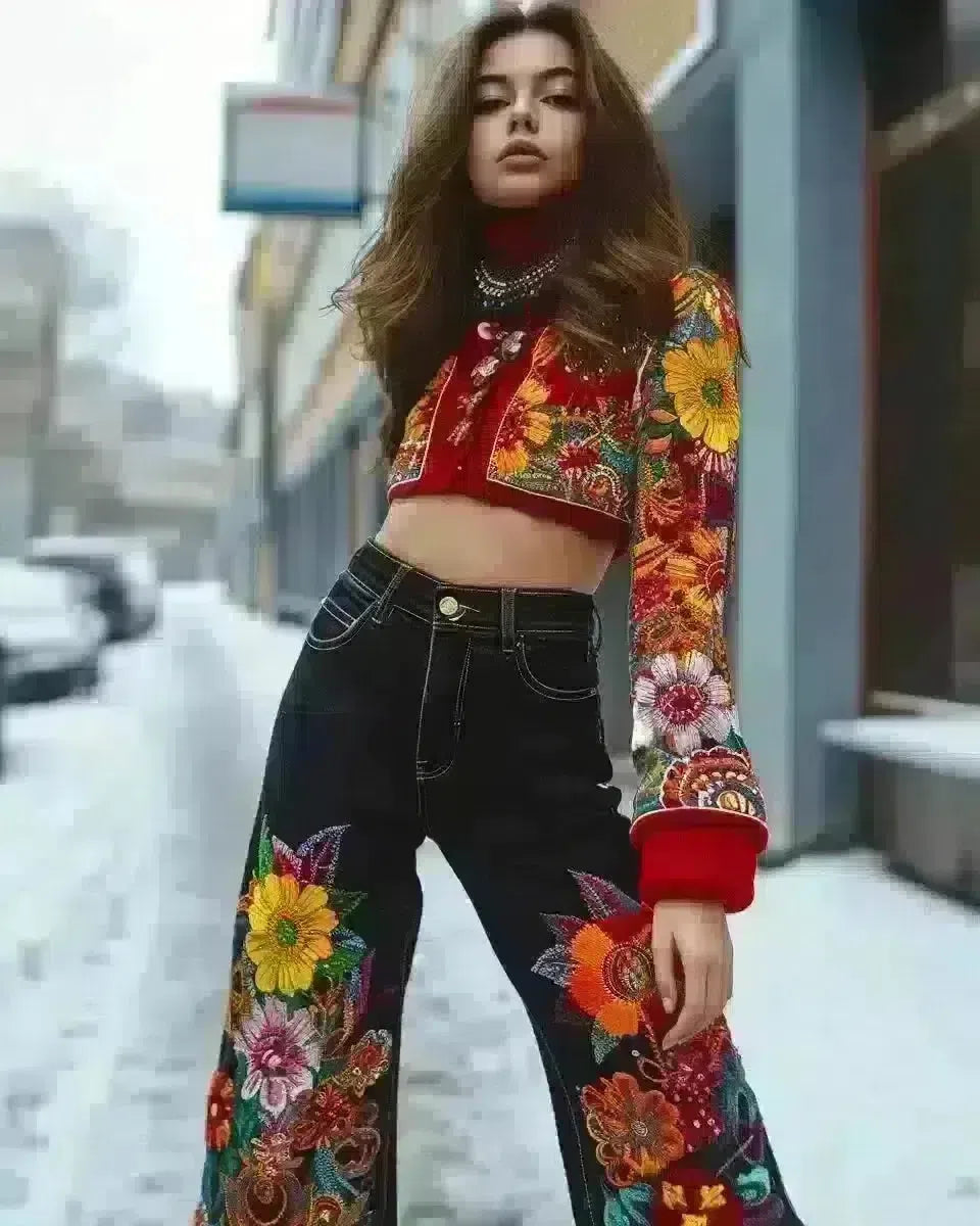 Elegant woman in colorful embroidered denim jeans, outdoor urban setting. Winter  season.