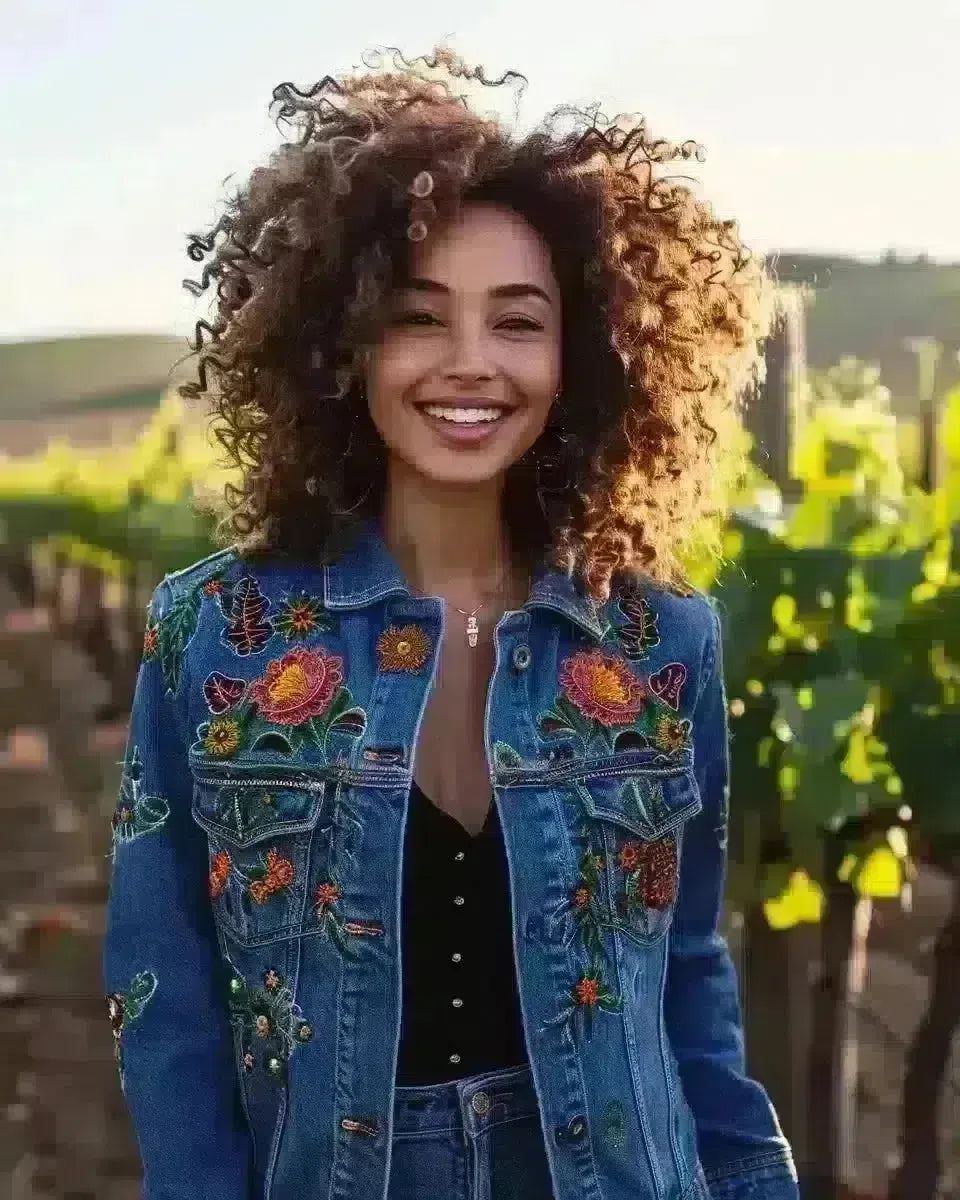 Multicultural women in embroidered denim jackets at a sunny California vineyard. Late Winter  season.