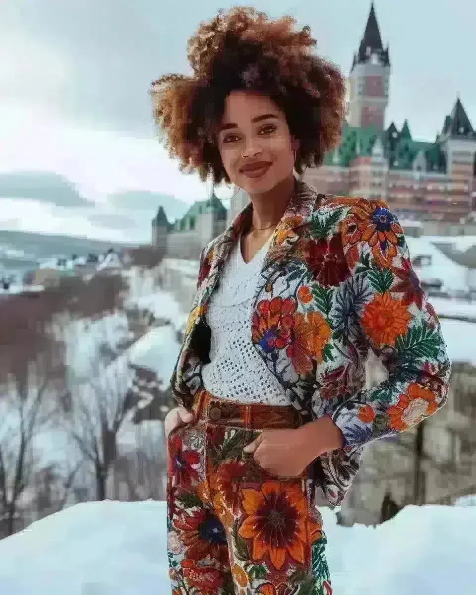 Ethnic woman in floral embroidered denim pants, Quebec city backdrop. Winter  season.