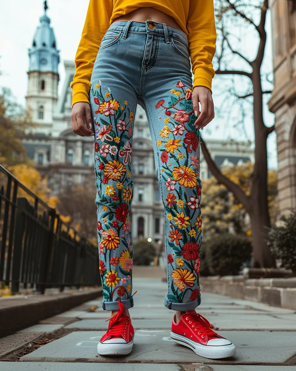 Woman in embroidered jeans with floral patterns, yellow top, red sneakers. Emphasize vibrant colors and fit. Autumn season. White female. Independence Hall, Philadelphia, PA background.
