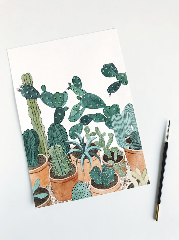 cacti scene painting with a paintbrush