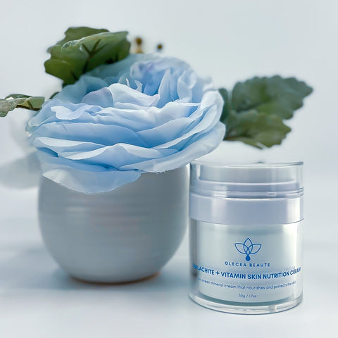 A jar of Olecea Malachite + Vitamin Skin Nutrition Cream, a popular wrinkle cream. This cream is packed with powerful ingredients that can help you achieve smoother, younger-looking skin.