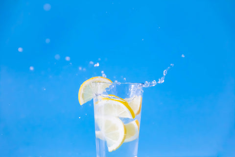 The importance of drinking water for overall health and skin hydration.